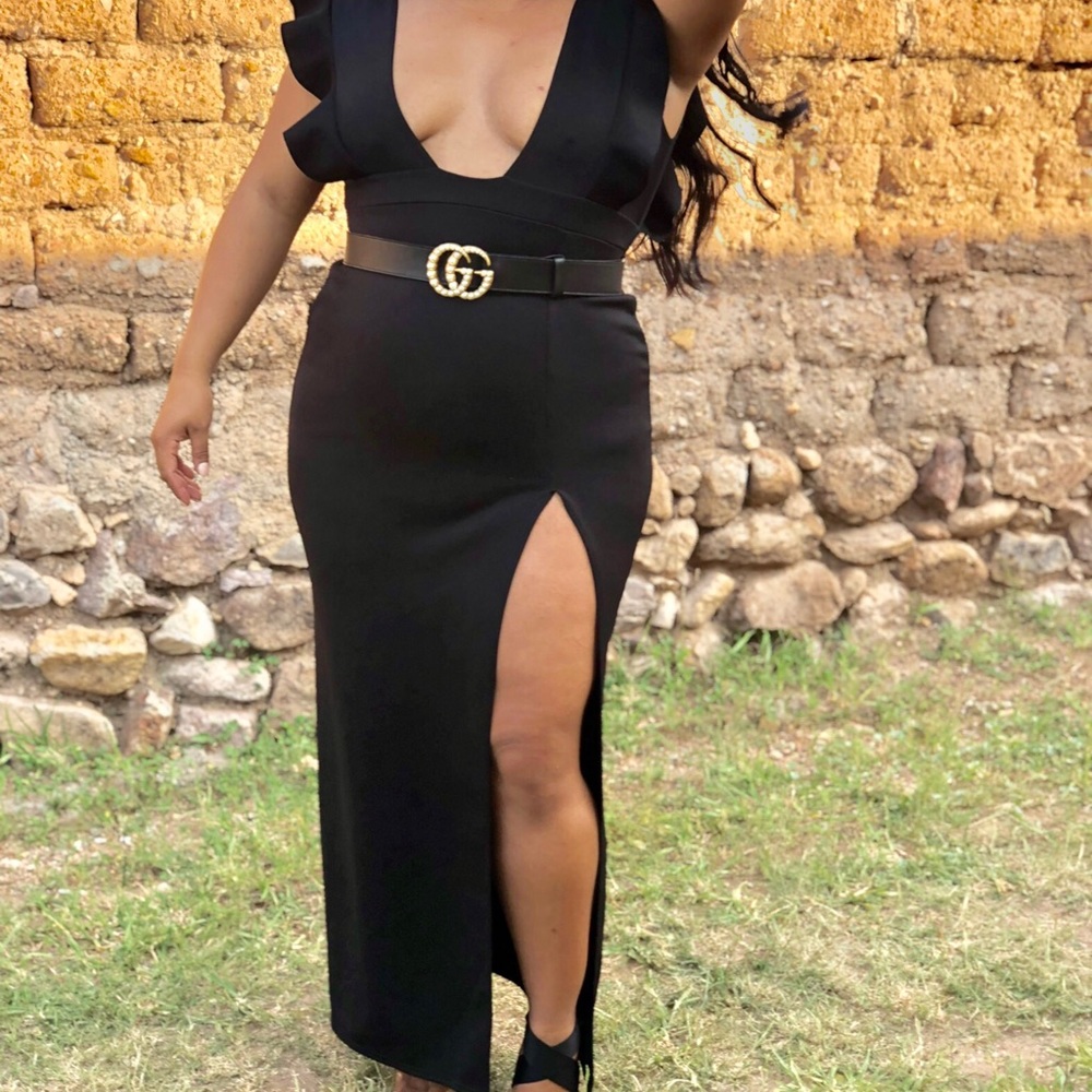 Black low cut high slit dress